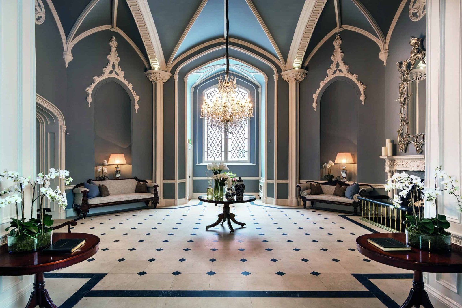 An ornately decorated Irish room with a chandelier.