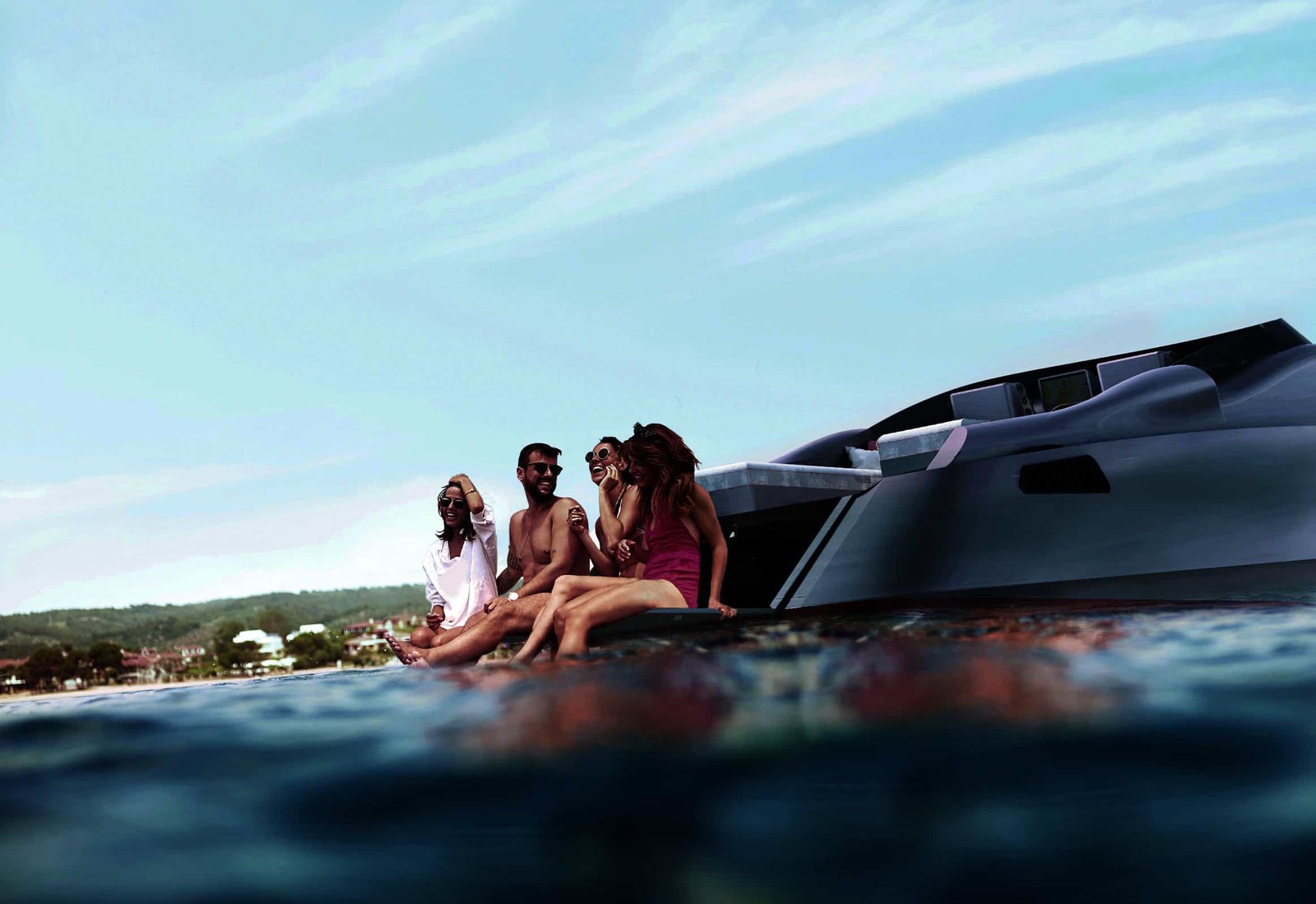 A group of people sitting on a bespoke yacht in the water.