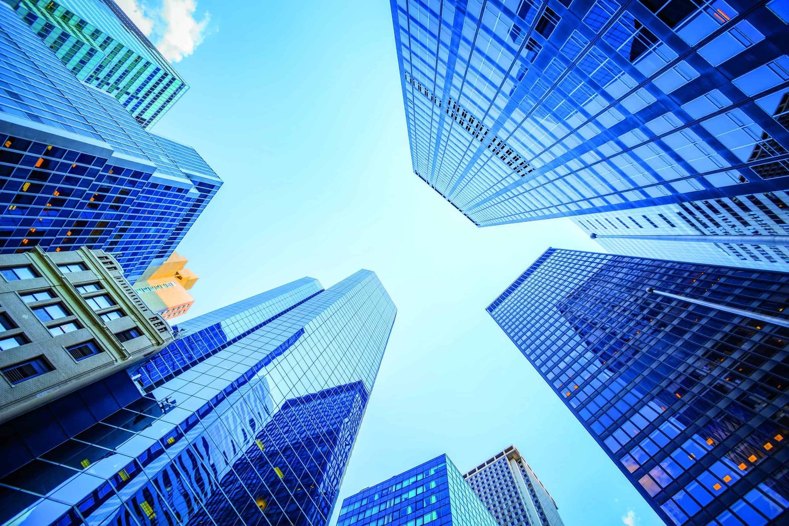 A view of skyscrapers reaching towards the sky in a city.