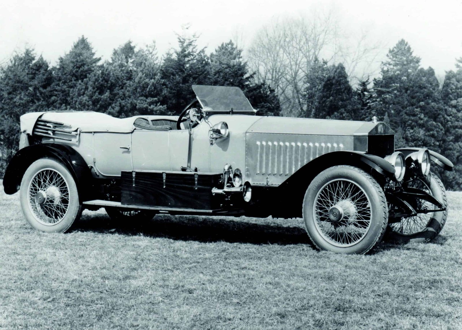 A vintage car captured in a black and white photo.