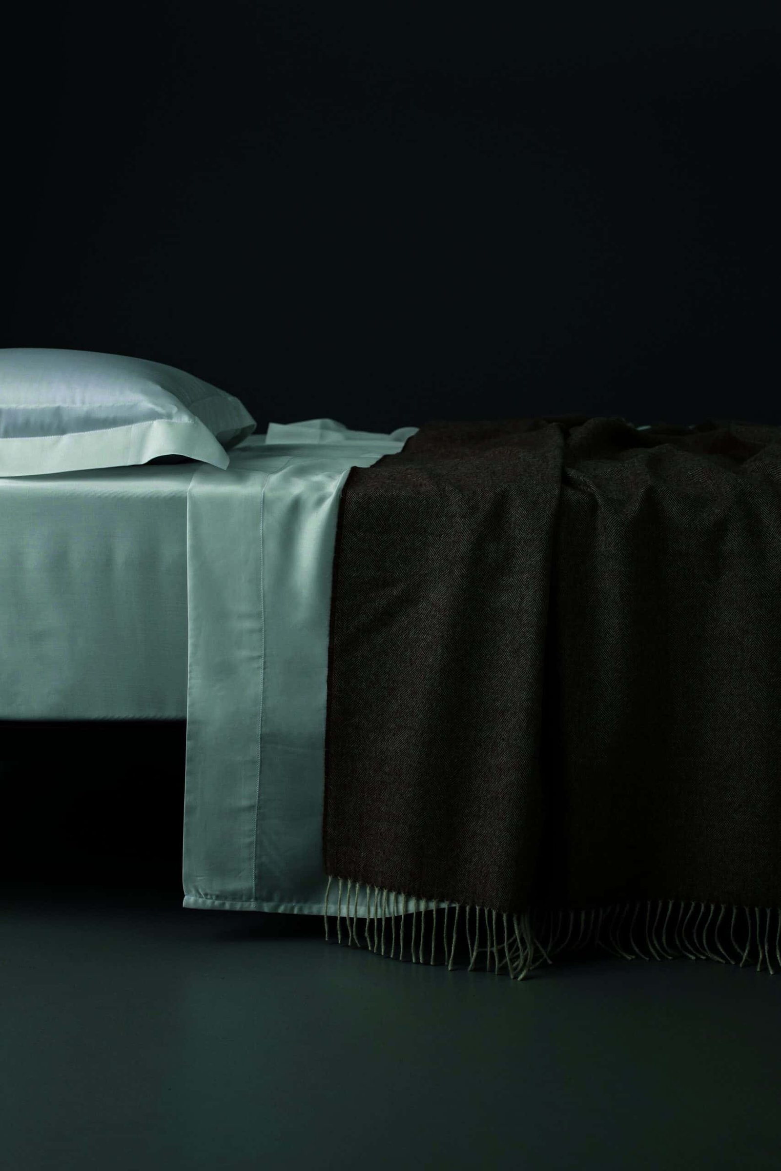 The best bedding on a bed, complete with a cozy blanket.
