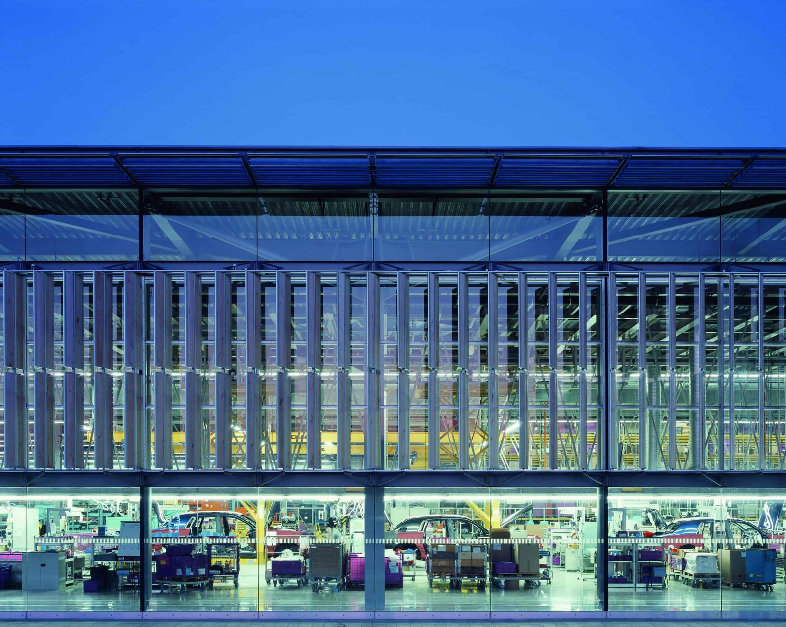 A large glass building with a lot of windows.