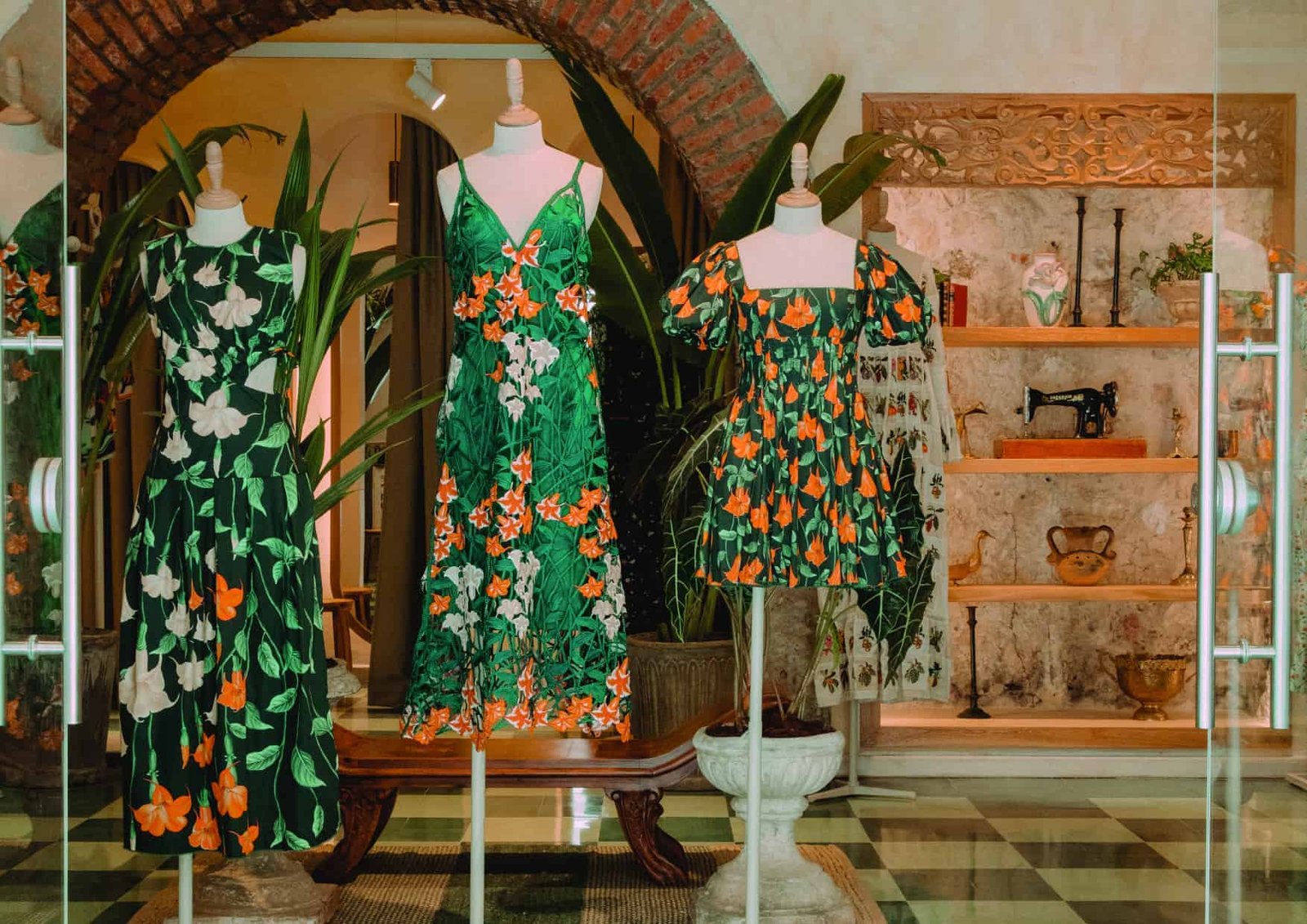 Mannequins dressed in Latin American attire on display in a store.