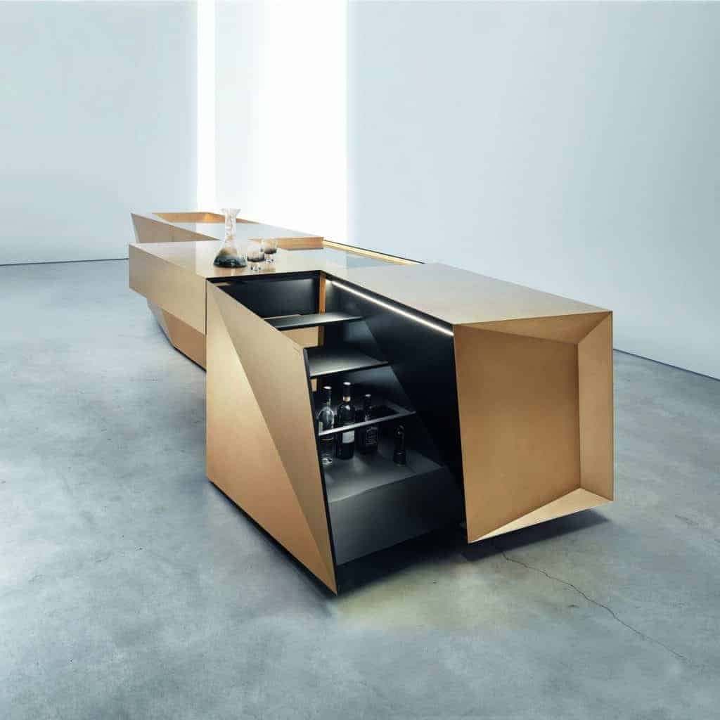 A modern kitchen with a wooden counter top that combines form and function.