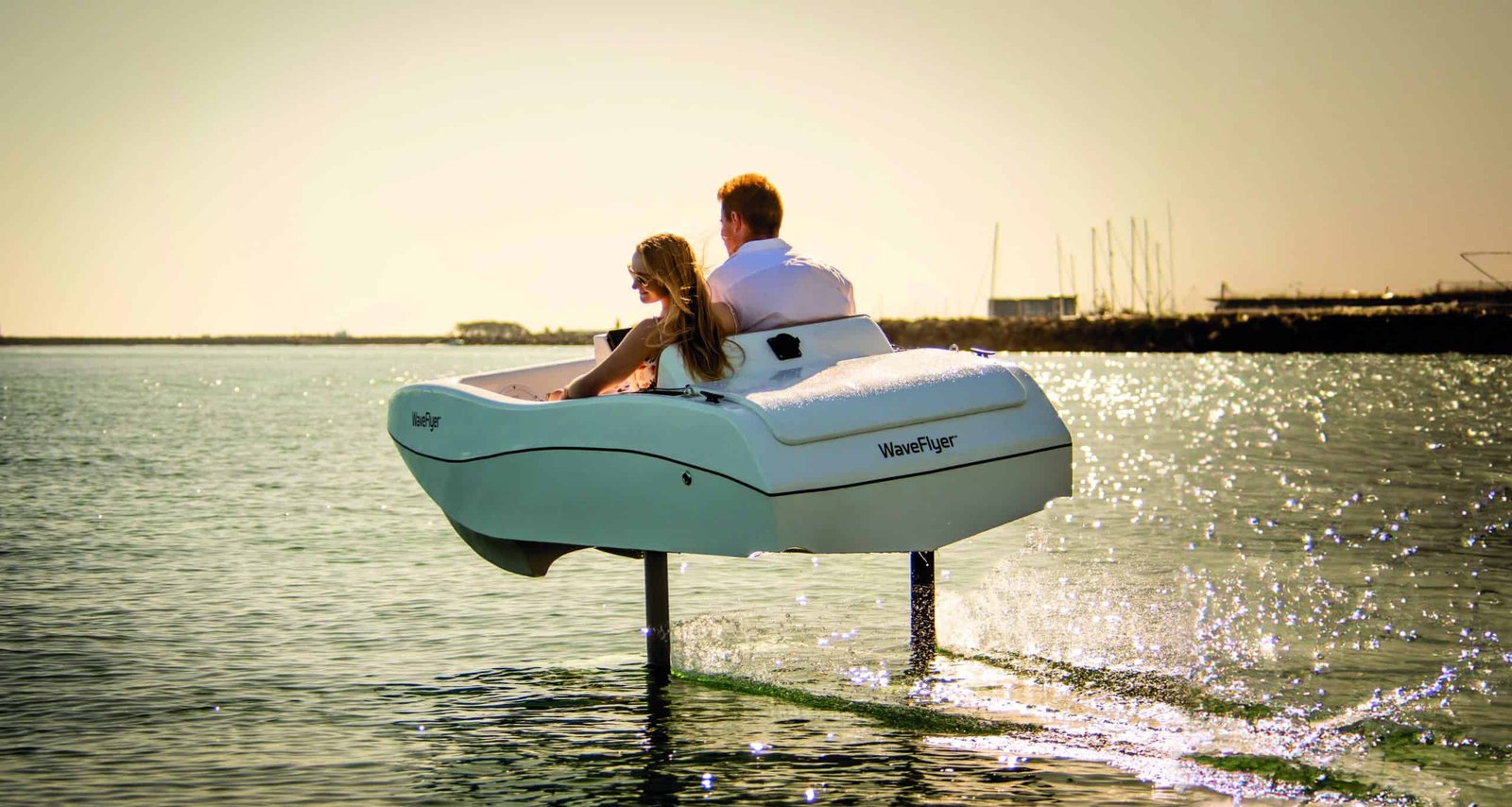 A couple on a luxurious boat cruise, gliding gracefully through the shimmering water.