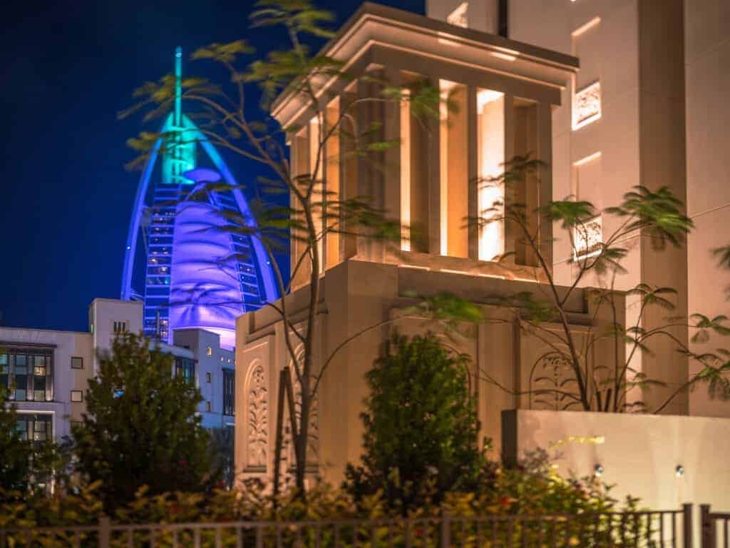 The lavish Burj Al Arab is lit up at night.