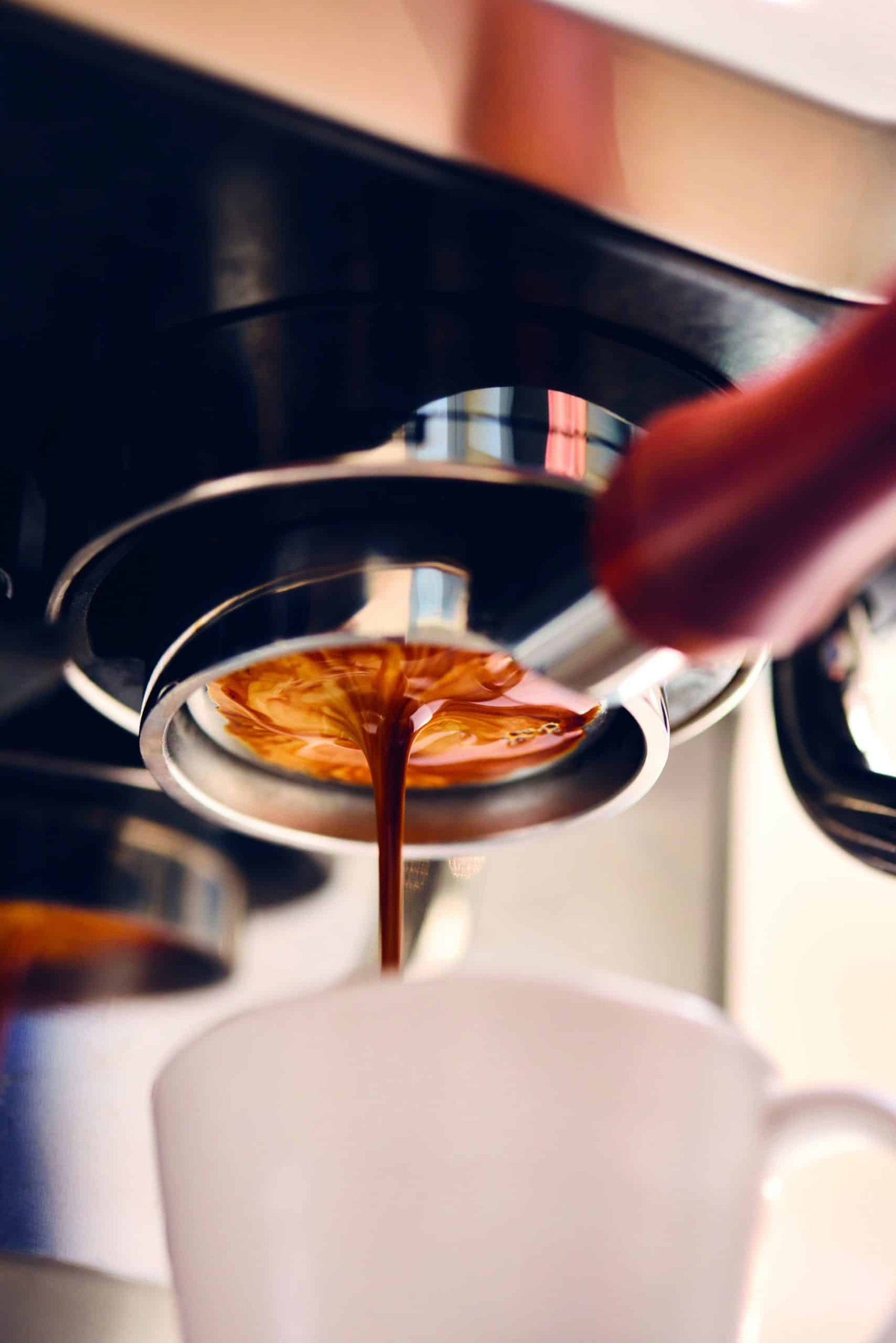 A character pouring coffee into a cup.
