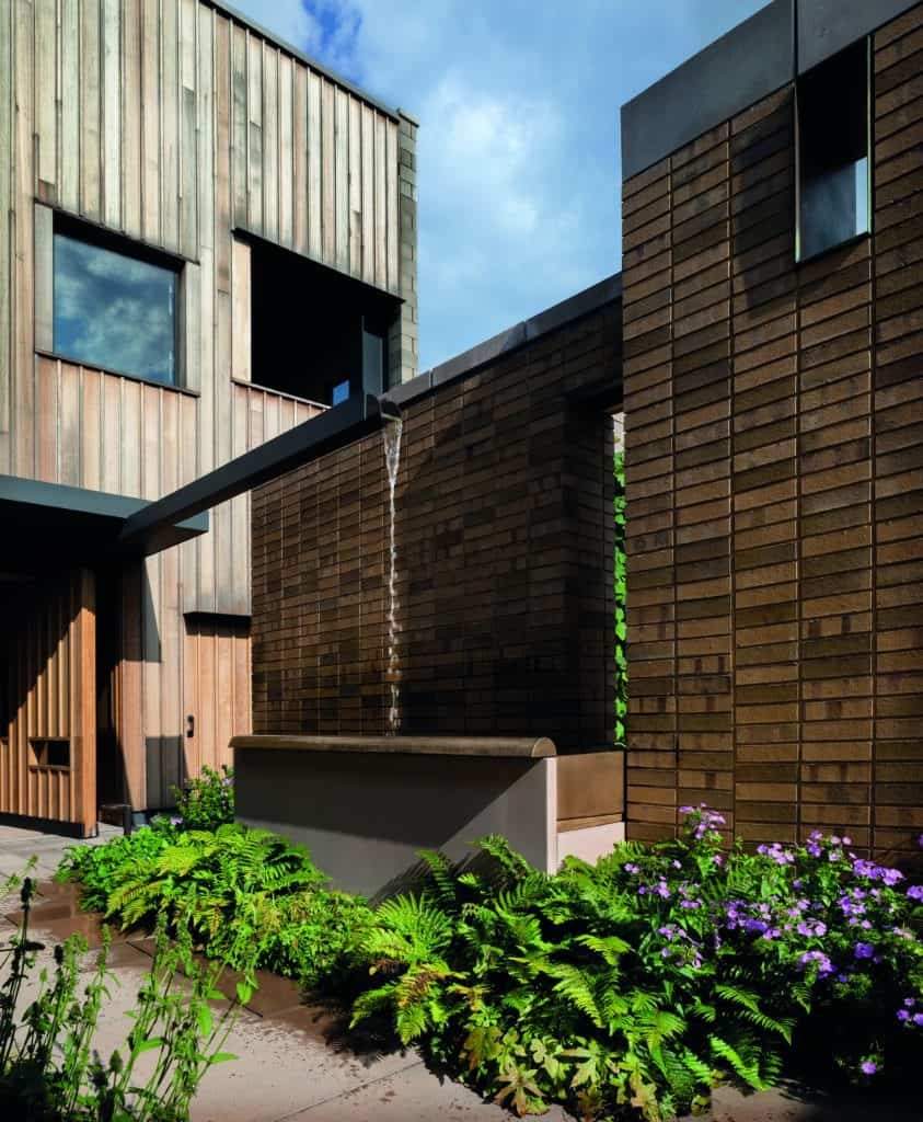 Creating a modern eco house with a water feature.