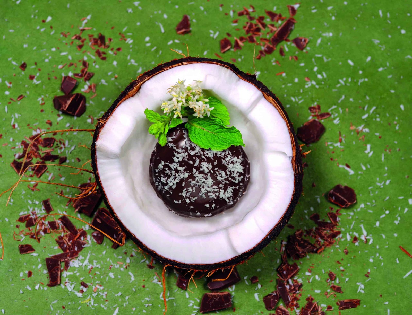 A CLASSic coconut shell filled with chocolate and mint leaves.