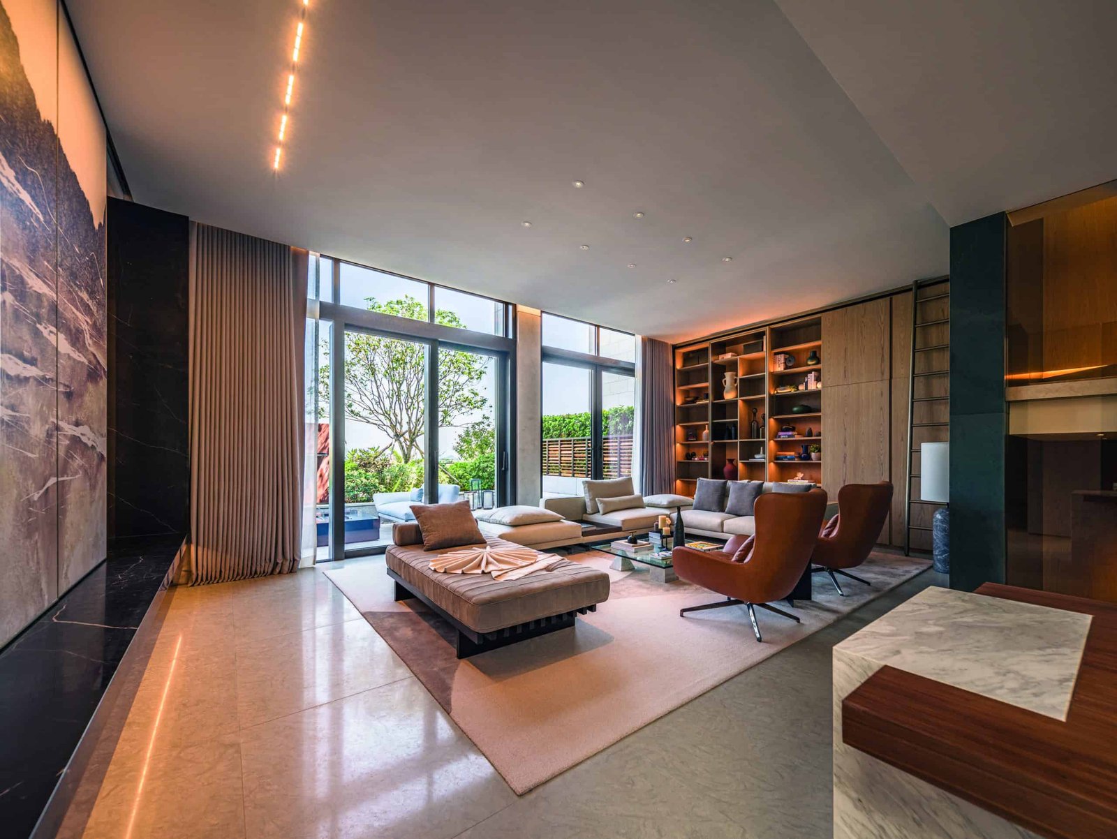 A hidden idyll with large windows in a modern living room.