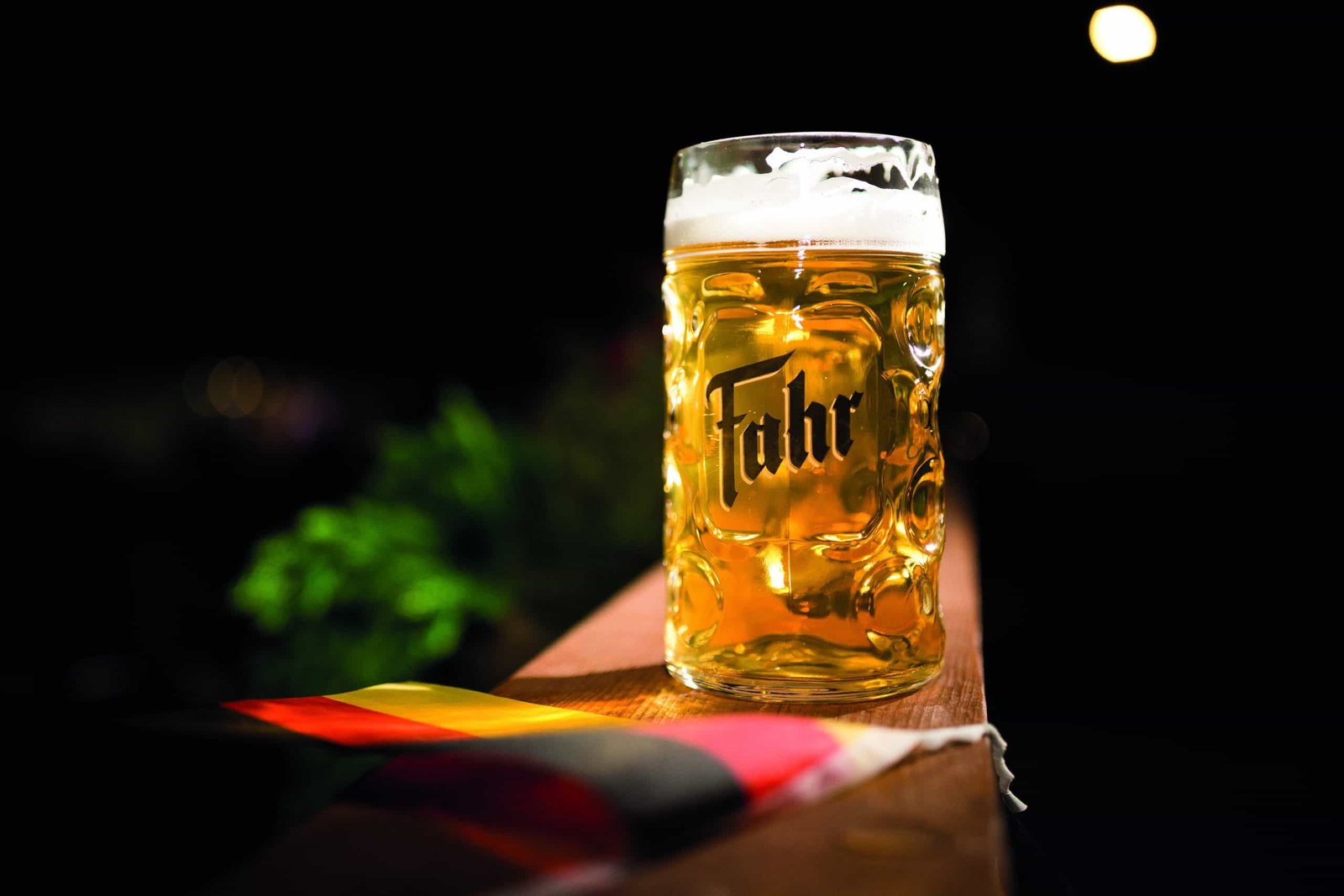 The best brew of beer sitting on a wooden table.