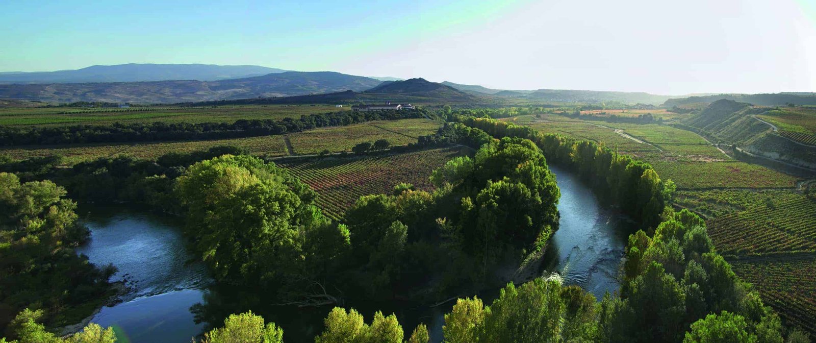 The best aerial view of a river in a valley region.