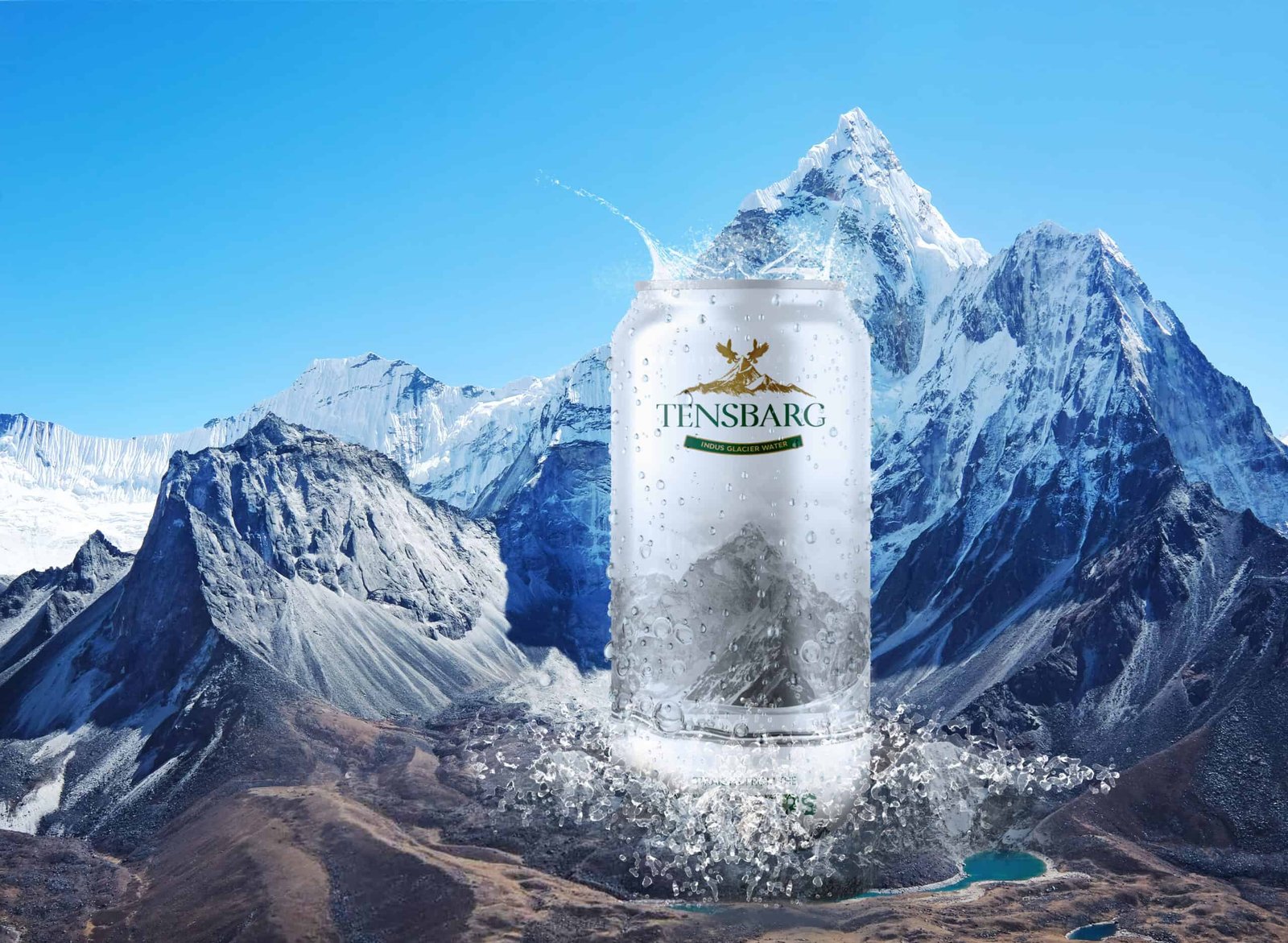 A source of water with mountains in the background.