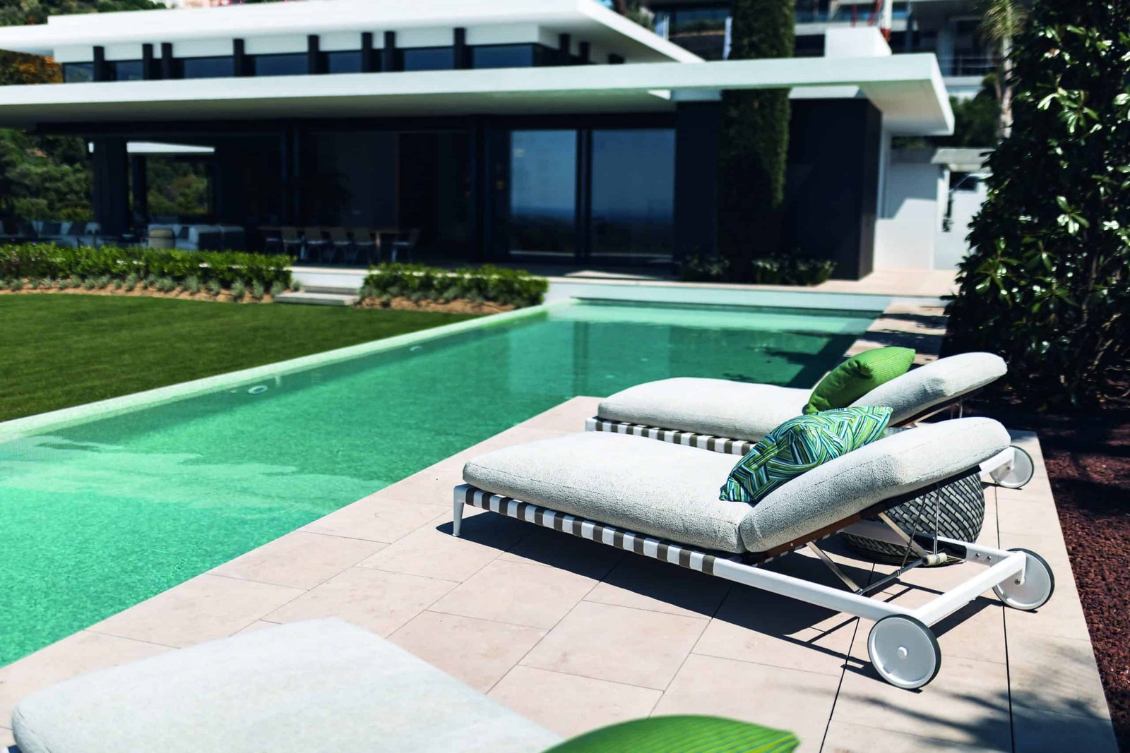 A sun-drenched home with a swimming pool.